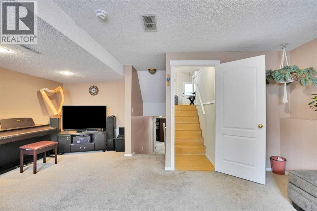 921 Arbour Lake Road Nw, Calgary, Alberta  T3G 4S9 - Photo 32 - A2316489