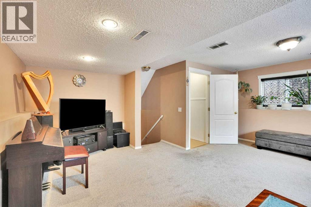 921 Arbour Lake Road Nw, Calgary, Alberta  T3G 4S9 - Photo 35 - A2316489