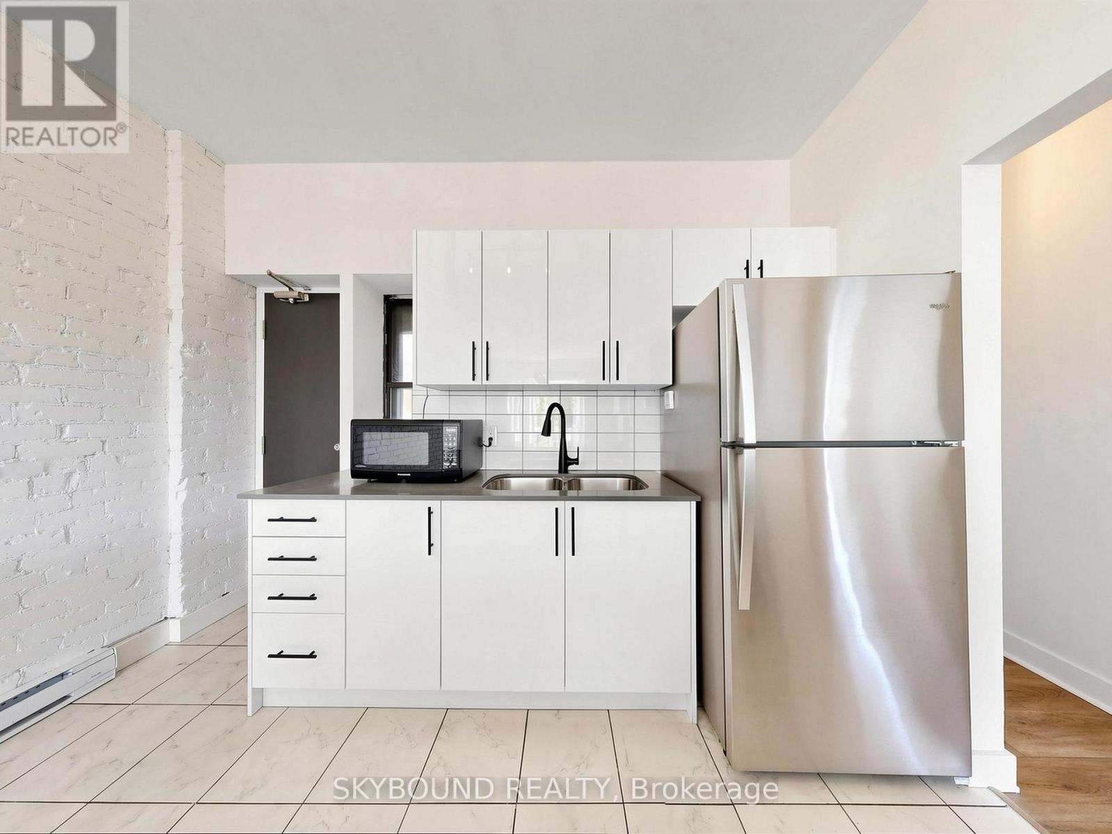 F - 133 Wineva Avenue, Toronto, Ontario  M4E 2T3 - Photo 17 - E13424360