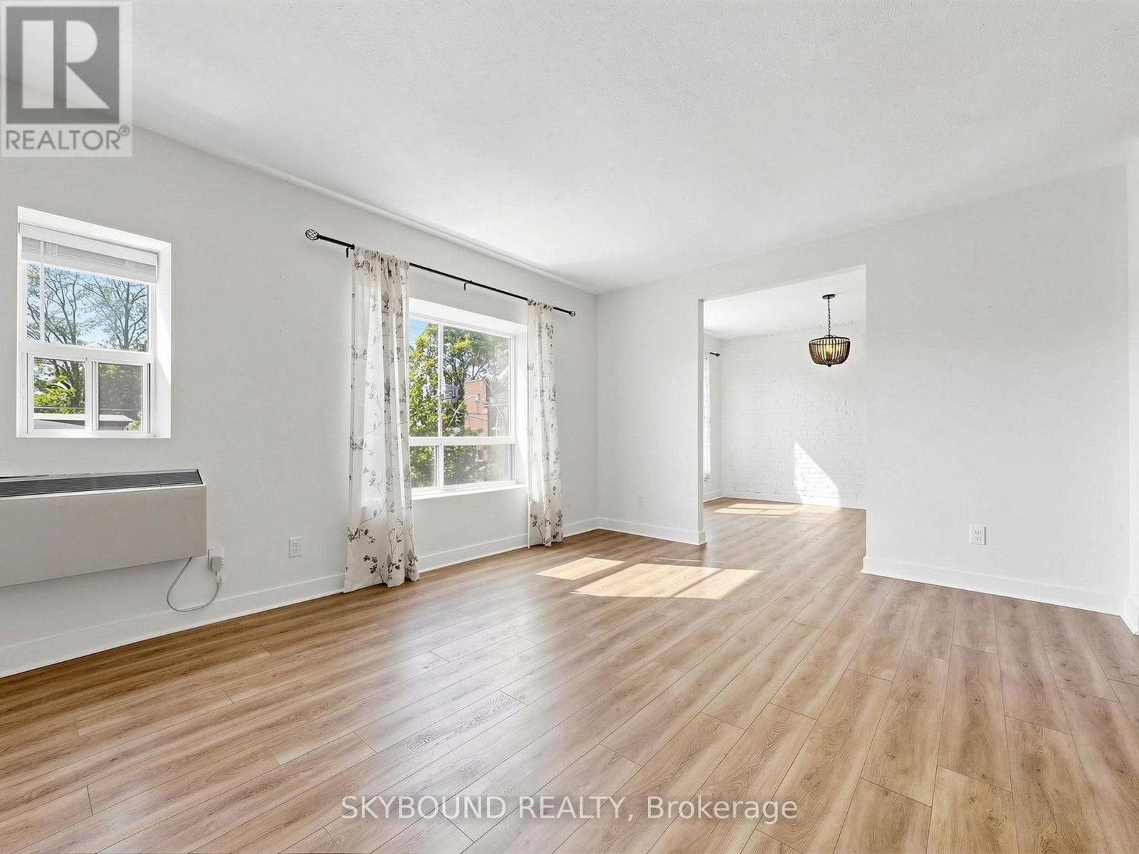 F - 133 Wineva Avenue, Toronto, Ontario  M4E 2T3 - Photo 4 - E13424360