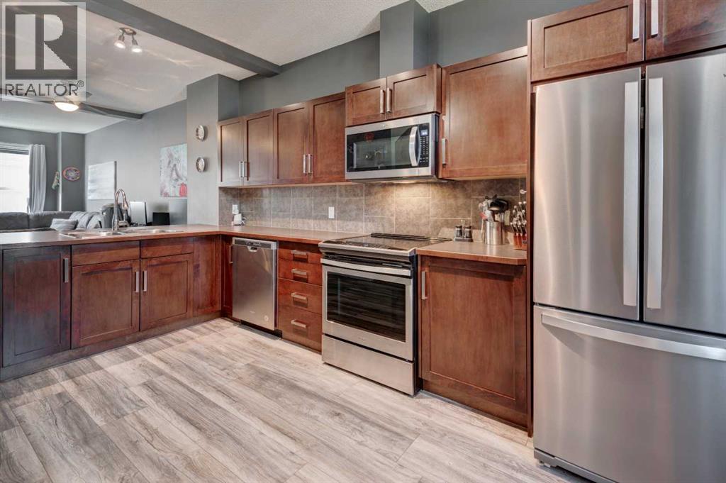 173 New Brighton Point SE, Calgary, Alberta  T2Z 1B6 - Photo 2 - A2302262