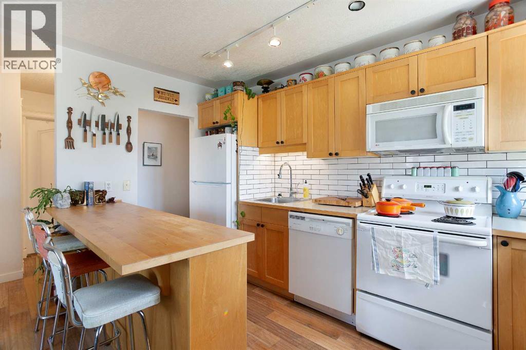 405, 2515 14a Street SW, Calgary, Alberta  T2T 3X6 - Photo 1 - A2310095