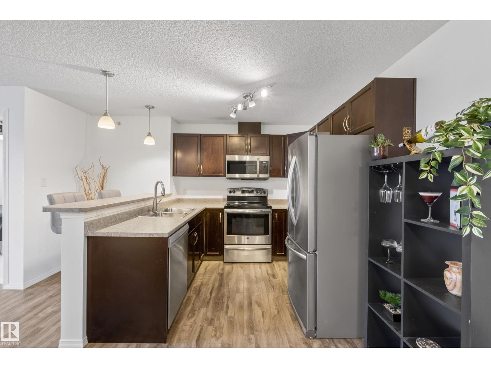 #414 5951 165 Av NW, Edmonton, Alberta  T5Y 0J6 - Photo 1 - E4491894