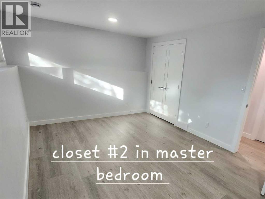 12108 Lake Waterton Way SE, Calgary, Alberta  T2J 2M4 - Photo 32 - A2318605
