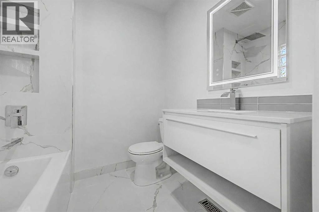 12108 Lake Waterton Way SE, Calgary, Alberta  T2J 2M4 - Photo 19 - A2318605