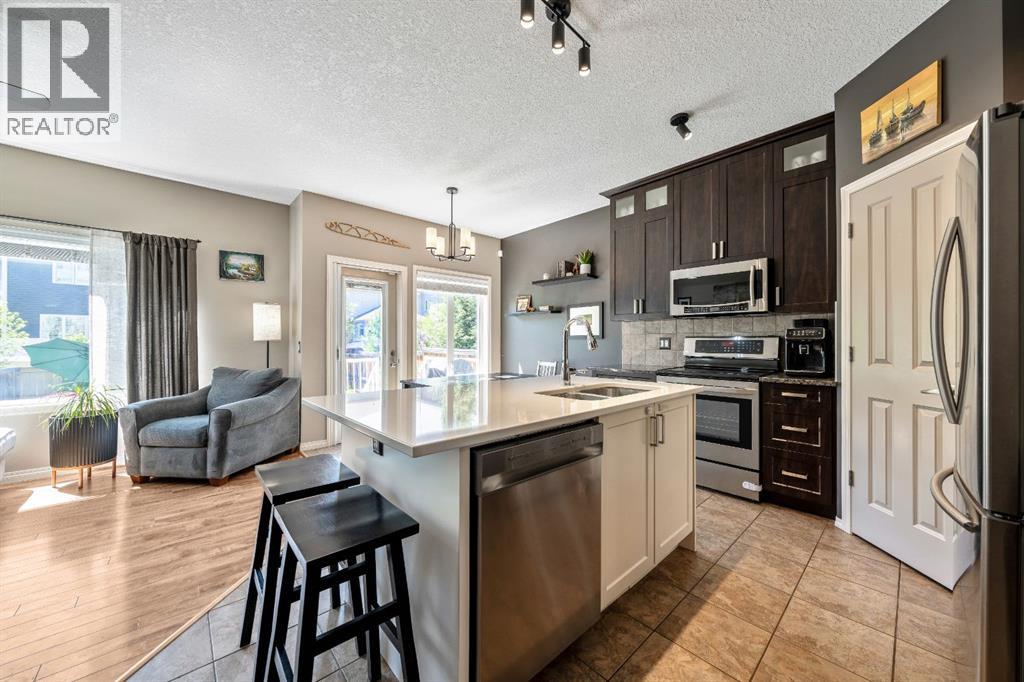 106 West Pointe Court, Cochrane, Alberta  T4C 0B9 - Photo 7 - A2317437