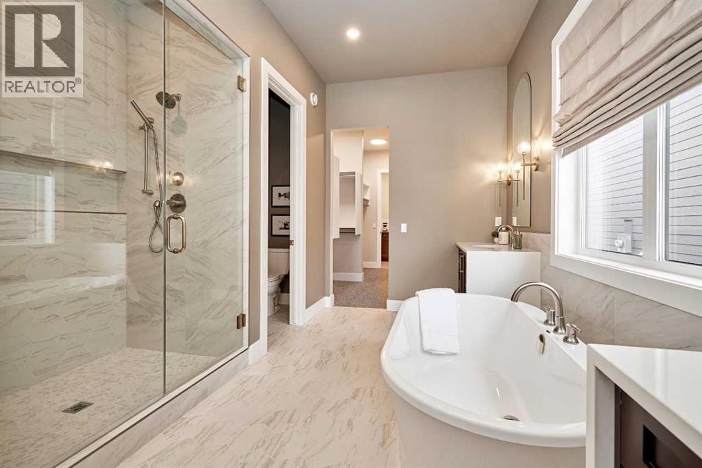 233 Rowmont Drive NW, Calgary, Alberta  T3L 2N7 - Photo 15 - A2188198