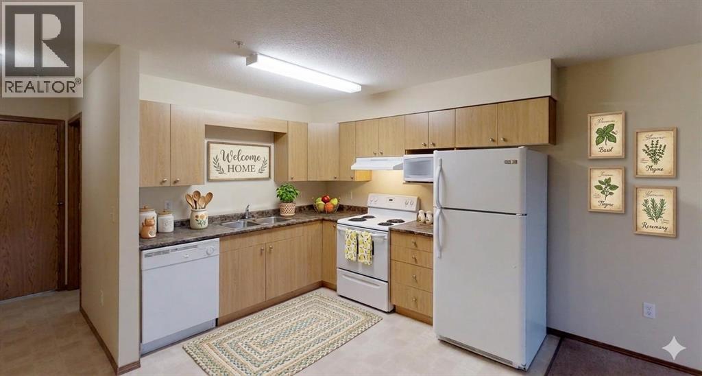301, 12025 Royal Oaks Drive, Grande Prairie, Alberta T8V 2K8 - Photo 4 - A2306454