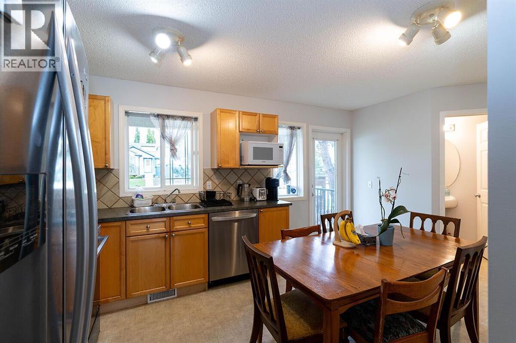 102, 950 Arbour Lake Road NW, Calgary, Alberta  T3G 5B3 - Photo 9 - A2318631