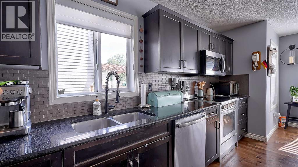 116 Kingsland Court SE, Airdrie, Alberta  T4A 0E5 - Photo 19 - A2317259
