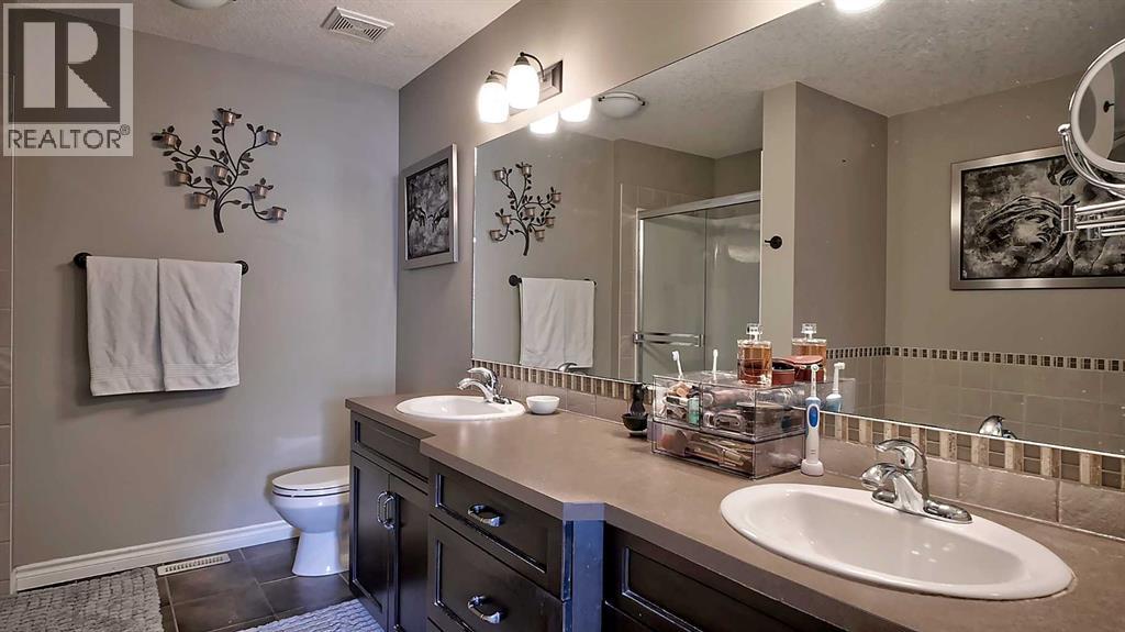 116 Kingsland Court SE, Airdrie, Alberta  T4A 0E5 - Photo 35 - A2317259
