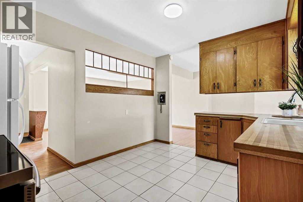 47 Clarendon Road NW, Calgary, Alberta  T2L 0P2 - Photo 12 - A2318269