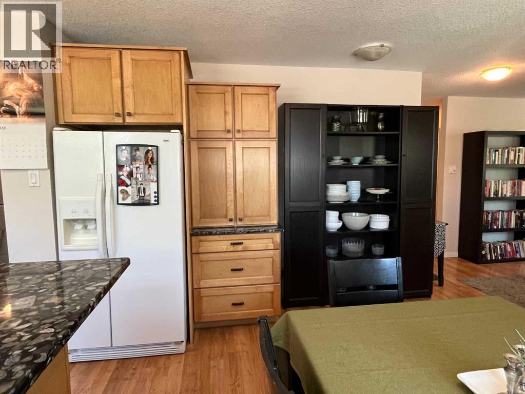235s 50 W, Raymond, Alberta T0K 2S0 - Photo 7 - A2314508