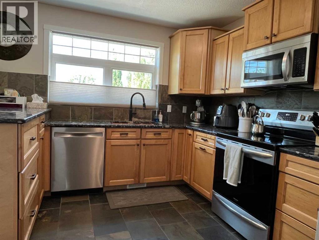 235s 50 W, Raymond, Alberta T0K 2S0 - Photo 6 - A2314508