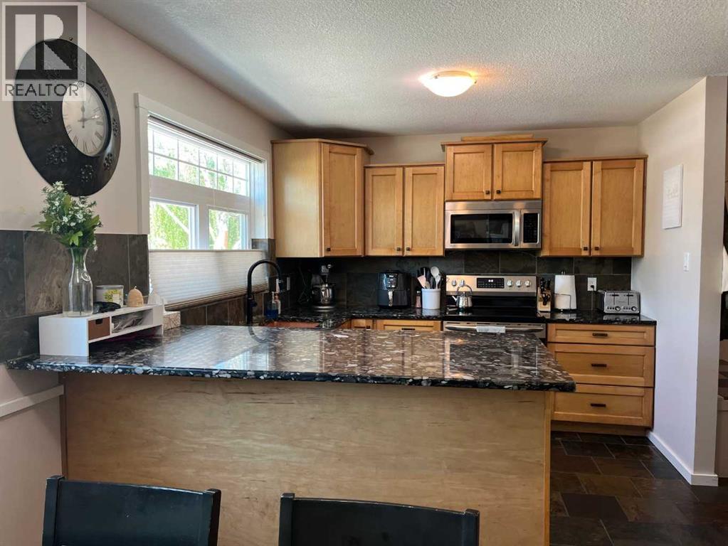 235s 50 W, Raymond, Alberta T0K 2S0 - Photo 5 - A2314508