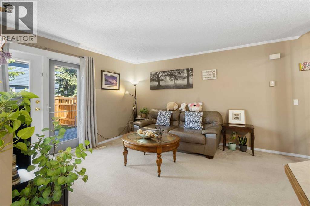 4, 203 Grier Terrace Ne, Calgary, Alberta  T2K 5Y7 - Photo 2 - A2319682