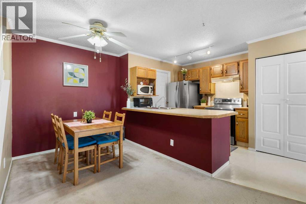 4, 203 Grier Terrace Ne, Calgary, Alberta  T2K 5Y7 - Photo 8 - A2319682