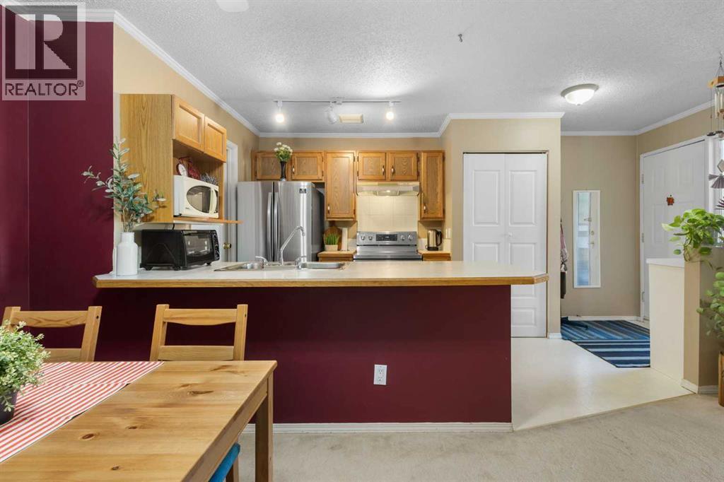 4, 203 Grier Terrace Ne, Calgary, Alberta  T2K 5Y7 - Photo 9 - A2319682