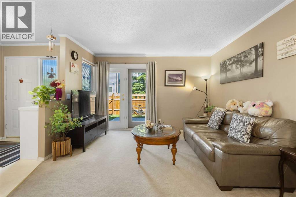 4, 203 Grier Terrace Ne, Calgary, Alberta  T2K 5Y7 - Photo 3 - A2319682