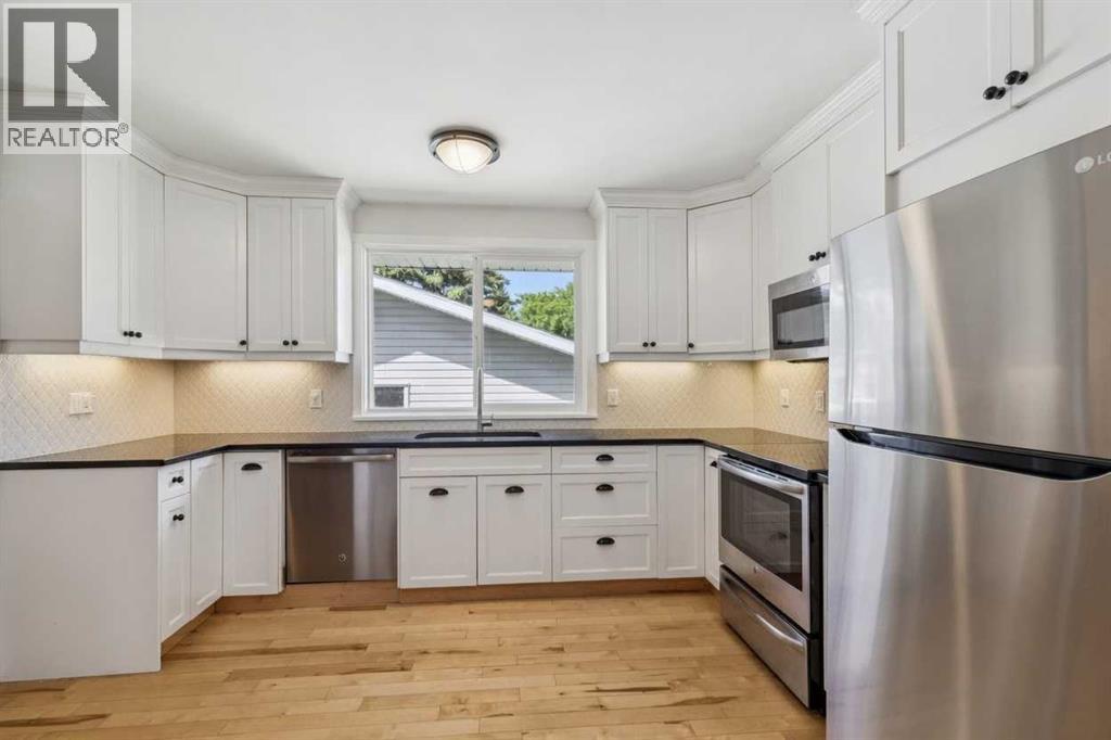 12223 Canfield Road Sw, Calgary, Alberta  T2W 1J8 - Photo 3 - A2311428