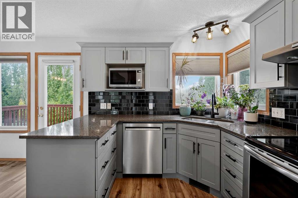 84 Hidden Spring Close NW, Calgary, Alberta  T3A 5K2 - Photo 4 - A2319136