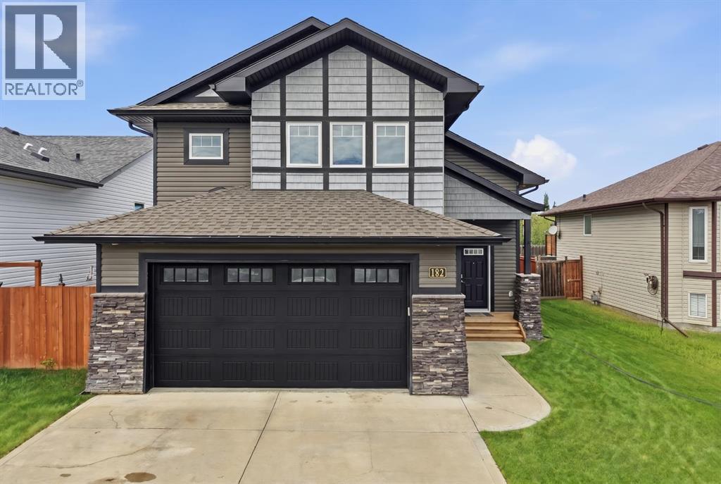 182 Robinson Avenue, Penhold, Alberta  T0M 1R0 - Photo 1 - A2310865