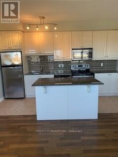 404 - 9225 Jane Street, Vaughan, Ontario  L6A 0J7 - Photo 2 - N13432238