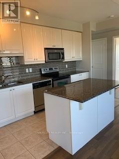 404 - 9225 Jane Street, Vaughan, Ontario  L6A 0J7 - Photo 4 - N13432238