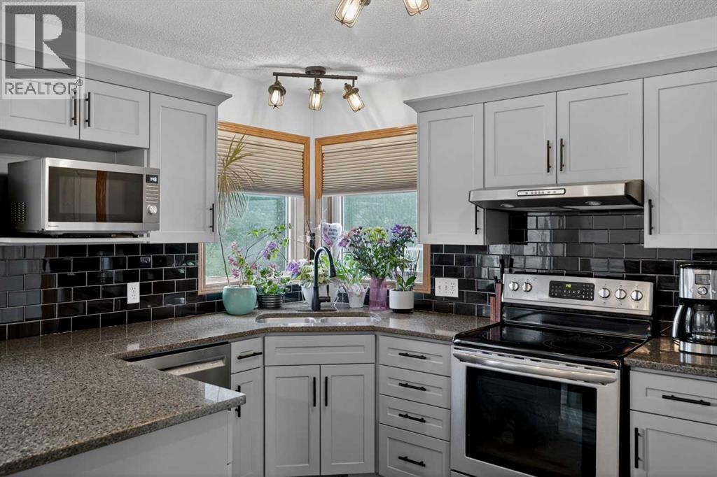 84 Hidden Spring Close Nw, Calgary, Alberta  T3A 5K2 - Photo 3 - A2319136