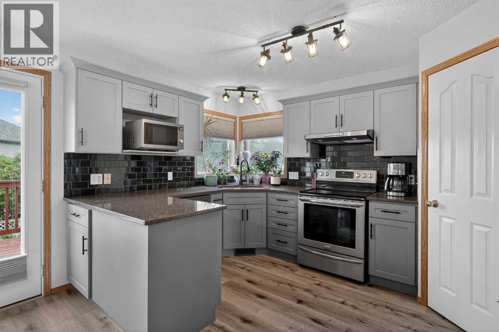 84 Hidden Spring Close Nw, Calgary, Alberta  T3A 5K2 - Photo 2 - A2319136