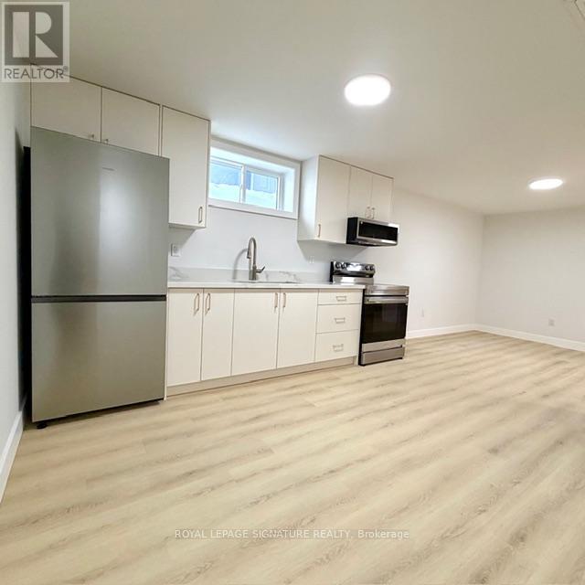 Lower - 293 Glebemount Avenue, Toronto, Ontario  M4C 3V4 - Photo 5 - E13432612
