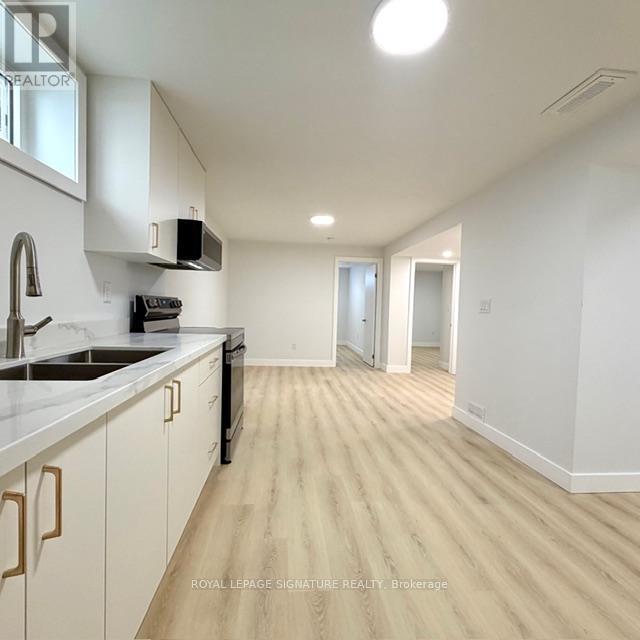 Lower - 293 Glebemount Avenue, Toronto, Ontario  M4C 3V4 - Photo 6 - E13432612
