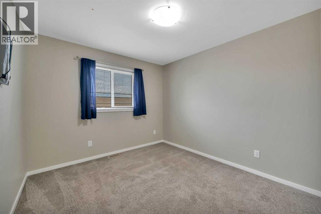 1002 Minto Street, Penhold, Alberta  T0M 1R0 - Photo 10 - A2320106
