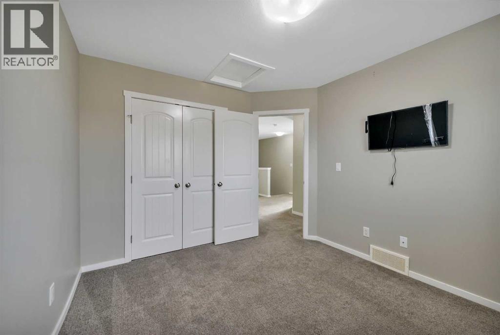 1002 Minto Street, Penhold, Alberta  T0M 1R0 - Photo 11 - A2320106