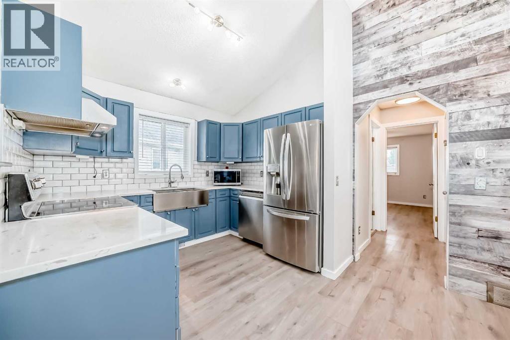 137 Erin Meadow Bay Se, Calgary, Alberta T2B 3A2 - Photo 7 - A2316817