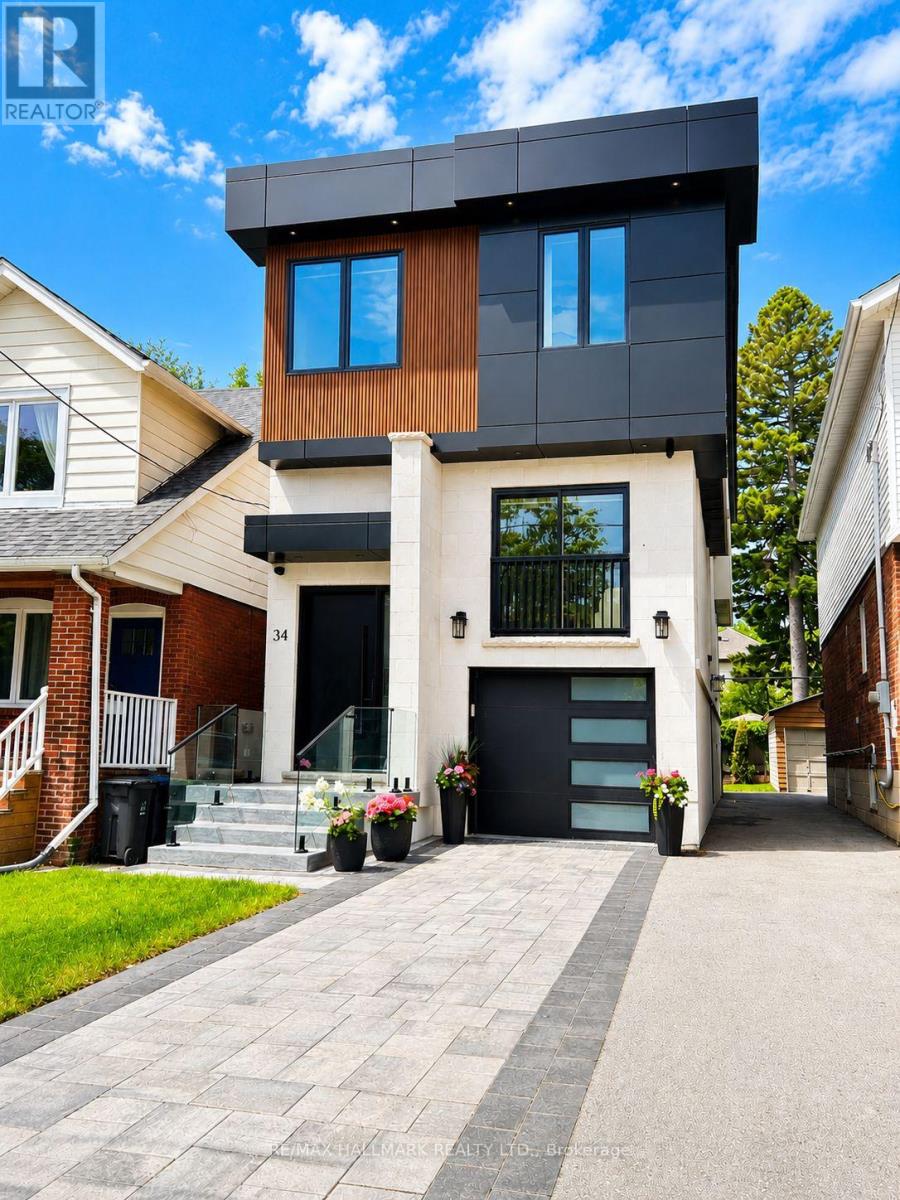 <div class="slider-price">$1,829,000</div><p>34 Roosevelt Road, Toronto, Ontario</p>