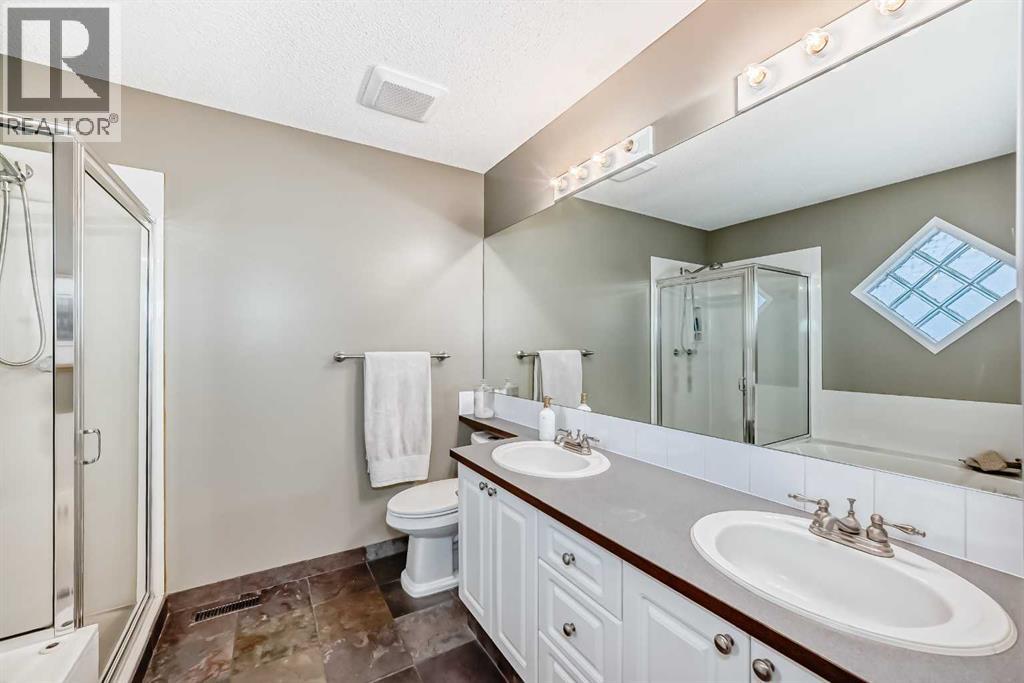409 Rocky Ridge Bay NW, Calgary, Alberta  T3G 4H8 - Photo 20 - A2319625