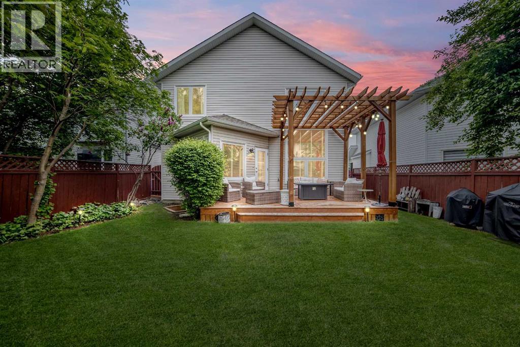 409 Rocky Ridge Bay NW, Calgary, Alberta  T3G 4H8 - Photo 2 - A2319625