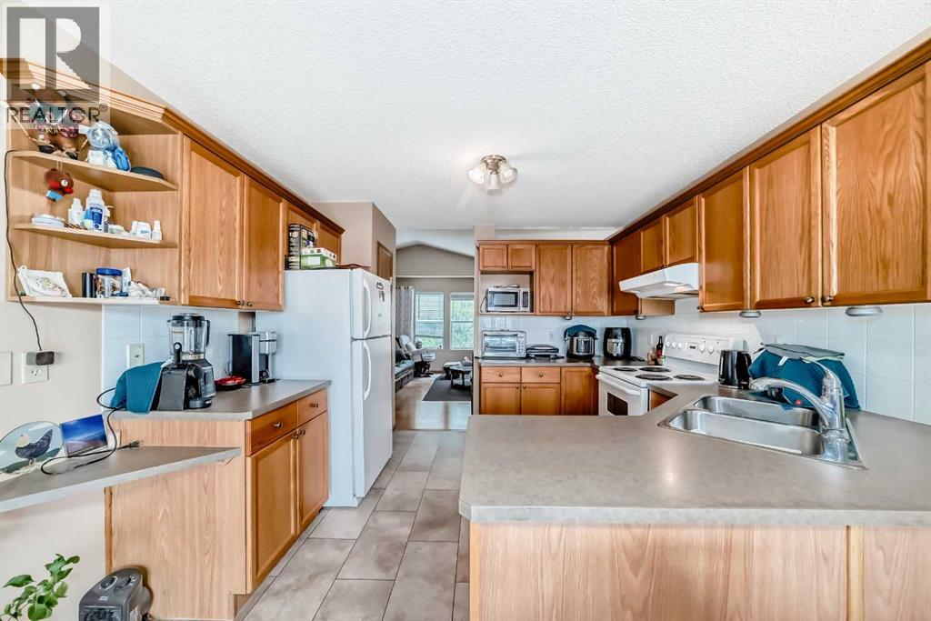 27 Covepark Drive NE, Calgary, Alberta  T3K 5T6 - Photo 9 - A2318996