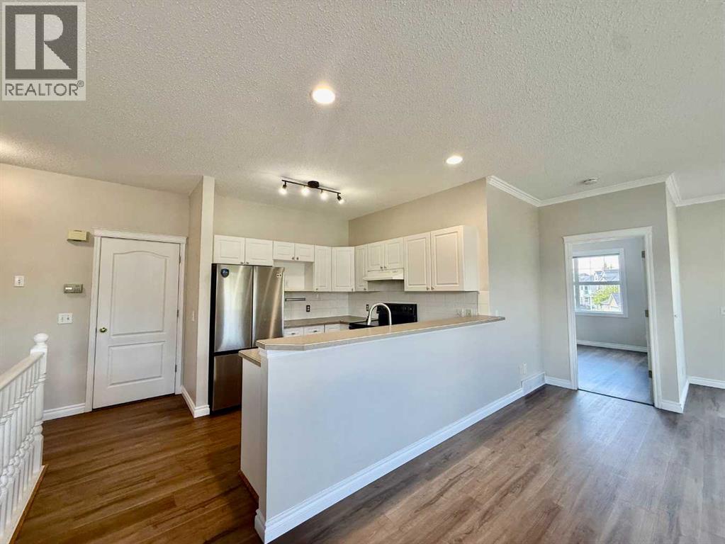 102 Prestwick Gardens Se, Calgary, Alberta  T2Z 3V4 - Photo 6 - A2311787