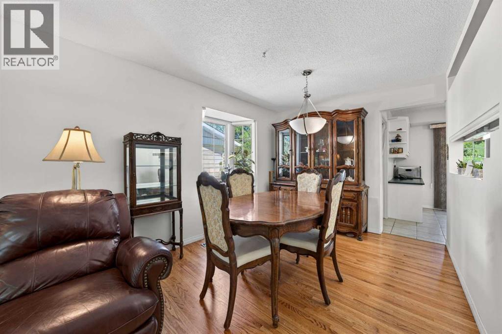 740 Hunterston Crescent NW, Calgary, Alberta  T2K 4N2 - Photo 7 - A2312853