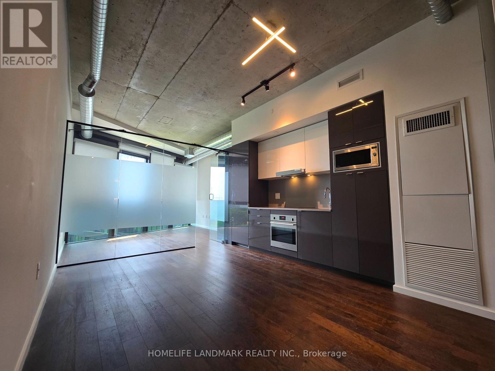 #618 - 21 Lawren Harris Square, Toronto, Ontario  M5A 0T4 - Photo 3 - C12885536