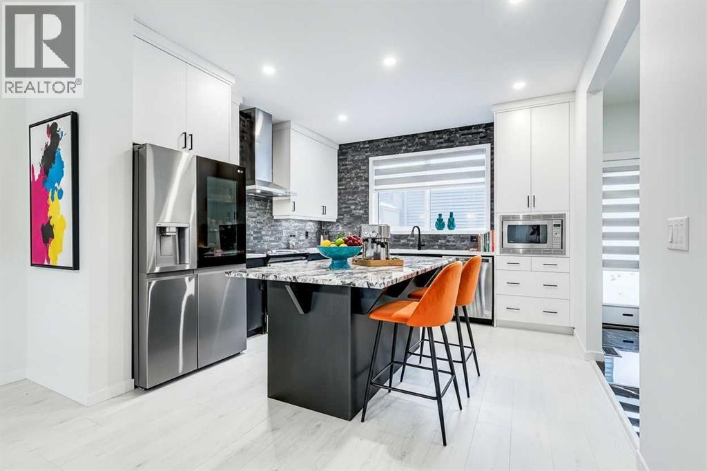 184 Rowmont Boulevard Nw, Calgary, Alberta  T3L 0H3 - Photo 4 - A2292864