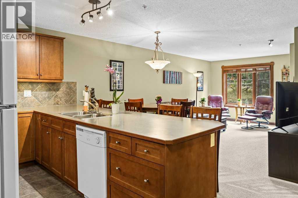 215, 150 Crossbow Place, Canmore, Alberta  T1W 3H5 - Photo 1 - A2320102