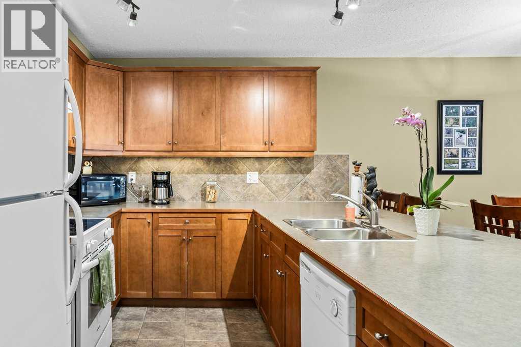 215, 150 Crossbow Place, Canmore, Alberta  T1W 3H5 - Photo 2 - A2320102