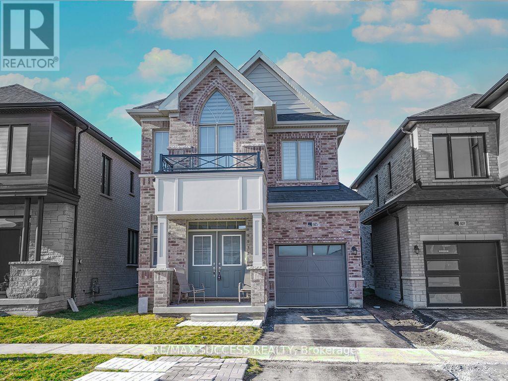 605 Etheridge Avenue, Milton, Ontario  L9E 1V5 - Photo 3 - W13435422