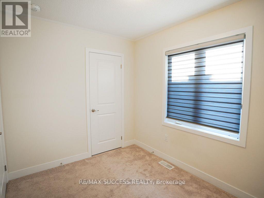 605 Etheridge Avenue, Milton, Ontario  L9E 1V5 - Photo 8 - W13435422
