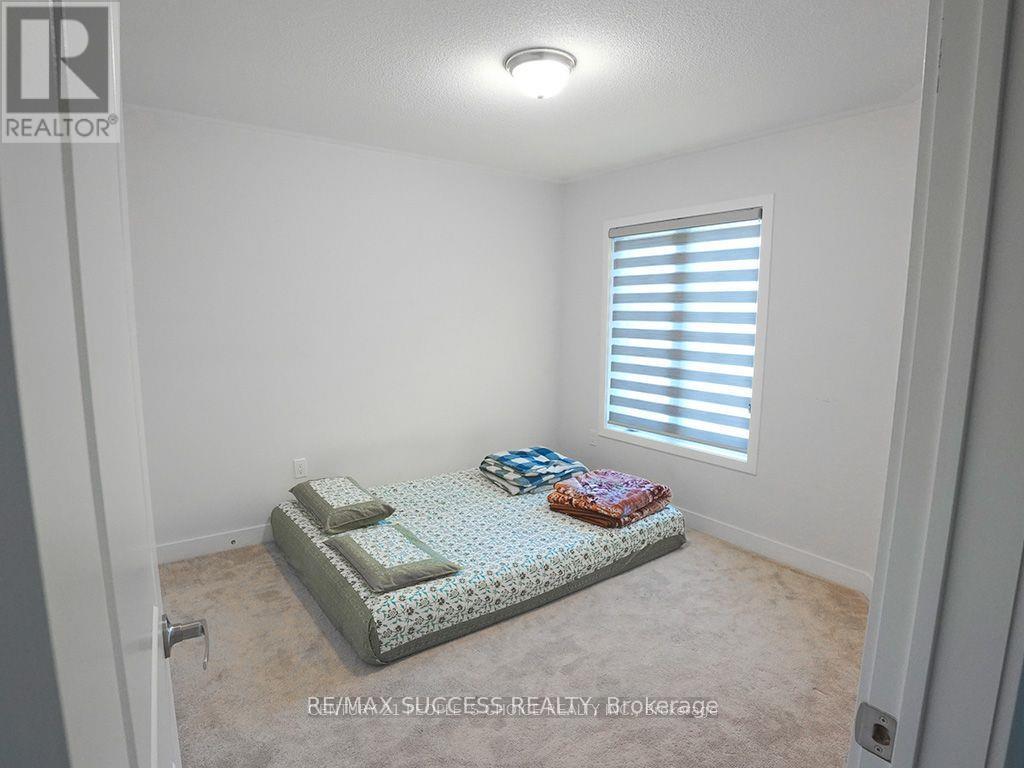 605 Etheridge Avenue, Milton, Ontario  L9E 1V5 - Photo 9 - W13435422