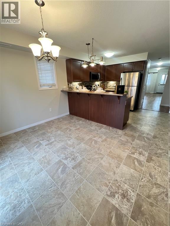 35 Mountford Drive Unit# 111, Guelph, Ontario  N1E 0G6 - Photo 6 - 40826033