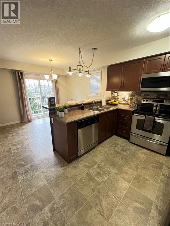 35 Mountford Drive Unit# 111, Guelph, Ontario  N1E 0G6 - Photo 5 - 40826033